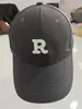 Nuevo logo R estilo de circunferencia de cabeza grande estilo visera estilo pareja versátil popular bordado de letras gorra de béisbol adelgazante de cara letra béisbol