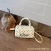 Bolso Cilíndrico de Alta Gama para Mujer Transfronterizo 2026 Nuevo Estilo Coreano Bolso de Mano de Lunares Bolso Fresco para Mujer Bolso de Hombro para Viajes