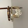 Pulsera Metálica de Estilo Europeo y Americano Vintage con un Toque Exagerado y Lujoso, Presentando un Diseño Abierto Retro