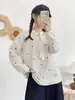 Colección Otoño 2026: Camisa casual de manga larga a rayas estilo japonés con bordado de corazón y detalle de corbata, corte holgado, para mujer