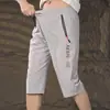 Pantalones cortos de seda helada para hombre de siete puntos con abertura, holgados, estampados, shorts exteriores, pierna recta, talla grande, pantalones cortos para personas con sobrepeso, intermedios