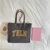 Nova mochila versátil de alta qualidade 2026, apresentando um estilo descontraído e doce, com uma bolsa tote de lona de grande capacidade adequada para uso casual e no trabalho.
