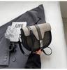 Bolso pequeño de estilo francés para mujer, bandolera de hombro estilo occidental de alta gama, popular en Internet, de crowdsourcing, 2024