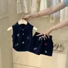 Conjunto de Verano para Niñas Timo 2026 Nuevo Chaleco de Punto con Lazo y Falda Floral de Dos Piezas Conjunto Moderno