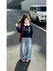 Conjunto de Primavera y Otoño para Niñas 2026 Nuevo Estilo Coreano Estilo Academia Sudadera con Cuello Polo Lazo Pantalones de Pierna Ancha de Mezclilla Dos Piezas
