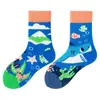 Calcetines originales de moda infantil AB color asimétrico dibujos animados longitud media otoño e invierno caramelos lindos calcetines de algodón para niños y niñas