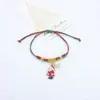 Pulseras navideñas hechas a mano más vendidas en Amazon transfronterizas, con diseños de Papá Noel y árbol de Navidad, con cordones rojos y verdes y un efecto que brilla en la oscuridad