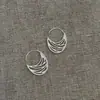 Nuevos aretes de textura hueca estilo chino para mujer, diseño de nicho, aretes de lujo ligero de alta gama, ear cuffs geométricos ovalados minimalistas