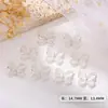 Decoración de arte de uñas de moda con forma de ojo de gato hueco y lazo con piedra de ojo de gato de aleación 3D y accesorios de mariposa para uñas