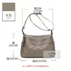 Bolsa Mãe de Couro Genuíno para Mulheres de Meia-Idade Modelo Novo 2026 Bolsa de Ombro Transversal de Couro Macio para Sogra Grande Capacidade Mochila de Meia-Idade Tendência