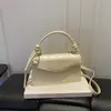Otoño 2026 Nuevo Elegante Hilo Bordado Letra Versátil Cruzada Simple de Mano Femenino Hombro Único Texturizado Al por Mayor Bolso para Mujer