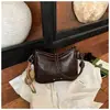 Bolso versátil para el día a día de moda transfronteriza para mujer, bolso de hombro cruzado de moda con textura de cuero encerado, bolso de axila de alta apariencia