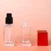 Botella cuadrada roja de 30 ml para base líquida, botella de vidrio para loción protectora, materiales de embalaje al por mayor, botella dispensadora de cosméticos