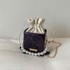 Mini Bolsa Pequeña 2025 Nuevo Estilo Bolso Cubo Casual Simple Cruzada Bolsa Pequeña Bolso de Mano con Cadena de Perlas para Mujer