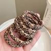 Rope para el pelo de tendón de cuero con estampado de leopardo sin costuras de alta elasticidad para otoño e invierno nuevo japonés y coreano Anillo para el pelo de mujer