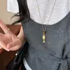 Estilo minimalista~Collar largo de metal con colgante de pez para mujer, nuevo modelo de verano, cadena para clavícula con cordón negro, accesorio versátil