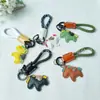 Hazte Rico en la Cuerda Trenzada de Cuero para Caballo Llavero de Coche Pareja Cuero Dibujo Animado Caballo Colgante Exquisito Colgante de Bolso Regalo