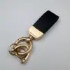 Chaveiro Pingente de Bolsa de Marca da Moda Padrão Fibra de Carbono Couro Carro Mini Curto Metal Chaveiro Presente Atacado