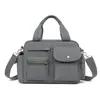 Moda Transfronteriza 2025 Nuevo Estilo Bolso Tote de Gran Capacidad Bolso de Hombro Cruzado Ligero Simple para Mujer Tela de Nylon Bolso de Dolor