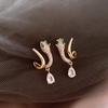 Aretes de Serpiente de Zirconia Nueva 2024 Estilo Frío Nicho Aretes Versátiles Aretes Elegantes a la Moda Sentido de Lujo Ligero de Alta Gama