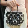 Bolsa Pequeña de Verano 2025 Nuevo Estilo Bosque Chica Suave Moda Hueca Pequeño Aroma Alto Grado Elegante Acrílico de Mano Tejida