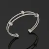 Pulsera de Alambre Trenzado de Acero Inoxidable Transfronteriza de David con un Toque de Alta Gama, Hecha de Aleación de Cobre, Lujo Ligero, Diseño de Nicho, Diseño de Trenzado Abierto
