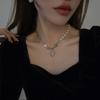 Collar de perlas de color crema con un toque moderno y moderno, con cadena de costura y colgante que combina con todo.