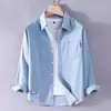 Camisa de mezclilla de manga larga transfronteriza para hombre, corte holgado estilo americano, chaqueta versátil lavada, ropa de trabajo ligera, camisa casual de primavera y otoño