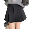Falda corta de lana con lunares estilo Miu en color gris para mujer, nuevo modelo otoño e invierno, talla grande, cintura alta, adelgazante, anti-exposición, plisada para mujer