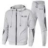 Traje deportivo de moda para hombre con cremallera y capucha, conjunto casual de tres rayas, nuevo de fábrica 2024, europeo y americano, transfronterizo