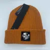 Sombreros de Otoño e Invierno Comercio Electrónico Transfronterizo Sombreros de Punto para Hombres y Mujeres Ropa de Trabajo Casual Europea y Americana Sombreros Cálidos para el Frío Sombreros de Lana Bordados con Letras