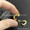 Nuevos pendientes CELI 2024 Arco del Triunfo forma de medio corazón para mujer, lujo ligero, alta gama, exquisitos, retro, venta directa de fábrica