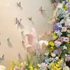 Adesivos de parede decorativos de borboleta 3D em PVC Monet Garden criam uma área de fotos atmosférica e um canto perfeito para fotos.