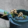Broche de dos pandas Guofeng con bonito tesoro nacional, broche de bambú con forma de panda trepador, accesorios antiluz para mujer