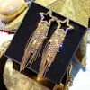Pendientes largos con borlas y diamantes de imitación de aguja plateada, estilo viento frío, con personalidad exagerada europea y americana, de celebridades de Internet, elegantes y modernos para mujer.