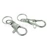 Venta al por mayor puntual Llavero con control remoto Llavero de aleación de zinc antirrobo para coche hebilla de perrito más 14 anillos dobles