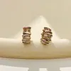 Pendientes vintage de alta gama estilo francés con pliegues irregulares tipo ola, diseño único, pendientes minimalistas