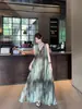 Vestido Longo Sem Mangas Fashionável para Férias na Praia Feminino Verão 2026 Decote V Profundo Design Degradê Vestido Chique