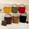 Bolso pequeño súper popular para mujer, nuevo modelo de verano 2026, bolso tipo cubo de hombro y cruzado de alta gama para el día a día