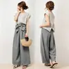 Conjunto de Dos Piezas en Stock Estilo Japonés 2026 Top de Manga Corta Murciélago con Cuello Redondo, Abertura Trasera y Lazo en la Cintura, Pantalones de Pierna Ancha
