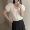 Estilo Chic Coreano 2026 Nuevo Principio de Primavera y Otoño Suave de Punto de Manga Corta Abullonada de un Solo Botón para Mujer