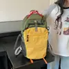 Mochila Coreana de Bloques de Color de Nicho para Mujer 2026 Nueva Mochila Pequeña Casual para Estudiantes Viajes Mochila de Montañismo Escolar con un Toque de Alta Gama