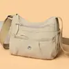 Bolsa Feminina de Lona Tecido Oxford Atacado 2026 Novo Estilo Tendência Versátil Ombro Único Transversal Simples Leve Bolsa para Mãe de Meia-Idade