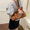 Bolsa Tote Suede Retrô Feminina 2026 Grande Capacidade Bolsa de Ombro para o Trabalho Outono Novo Bolsa Casual de Alta Qualidade