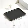 Bandeja rectangular de plástico estilo lujo ligero negro con borde dorado para uso doméstico en la sala de estar, para colocar tazas de té, platos, frutas y bocadillos