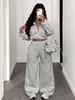 Venta al por mayor de pantalones cargo y pantalones de jazz de estilo Kpop girl europeo, americano, japonés y coreano, modernos, con estampado de estrellas