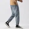 Jeans holgados tipo harén cónicos para hombre 2024 nuevo verano alta calidad marca de moda americana high street holgados elásticos versátiles pantalones largos