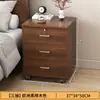 Mesita de noche con cerradura Armario de almacenamiento para dormitorio en casa Estante de almacenamiento extraíble para mesita de noche Armario pequeño de almacenamiento Nuevo estilo 2025