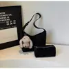 Bolsa de Luxo Leve Estilo Coreano Nicho para Mulheres Inverno 2025 Nova Bolsa de Ombro Estilo High-End Versátil para o Dia a Dia Bolsa Transversal