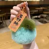Suerte Colgante de Peluche de Caqui Llavero Adorno Caqui Suerte Colgante para Coche Adorno de Piel Sintética de Conejo Regalo